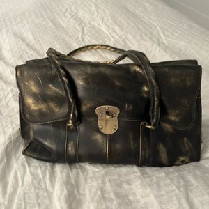 Patricia Nash handbag never been worn good and black all distressed leather
